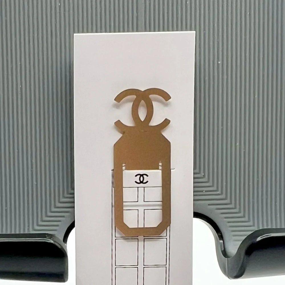 New CHANEL Gold Logo Bookmark